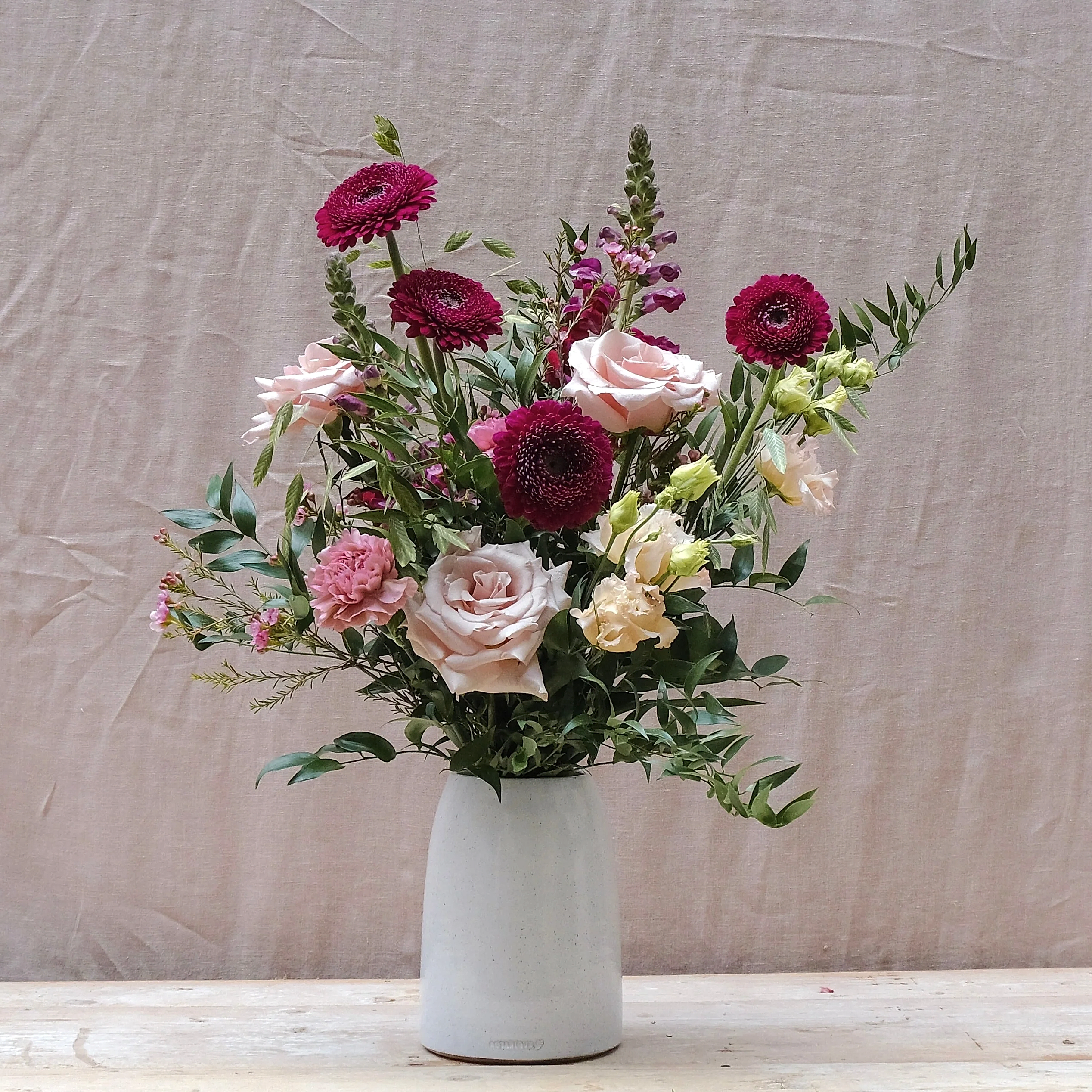 romantic bouquet with burgundy and pink flowers
