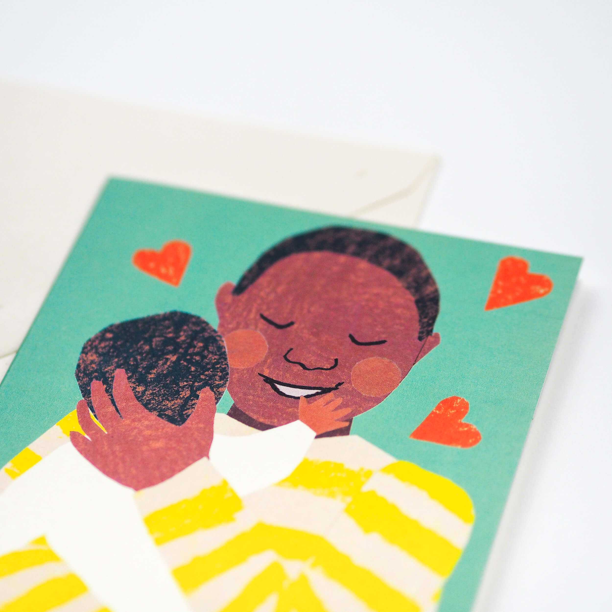 New Baby Cuddle Male Greetings Card